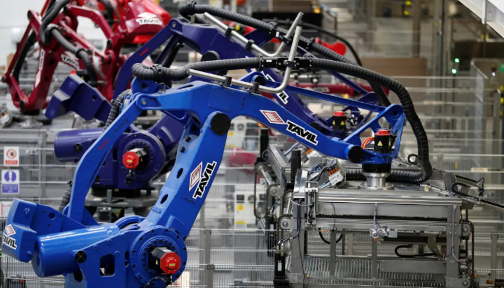 Robotické rameno v průmyslové hale